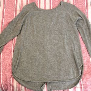 Light sweater with buttons down back. No defects . Like new.
